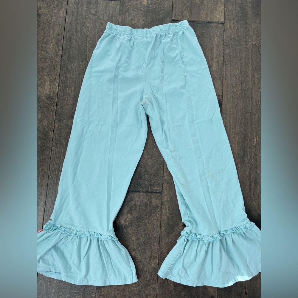 Light Blue Ruffle Hem Pants. Gently used